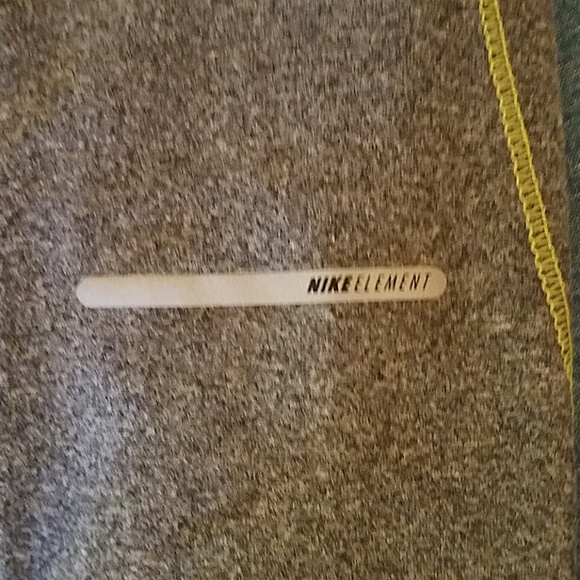 NWOT Nike Dri-FIT top with reflective strips - Picture 7 of 8